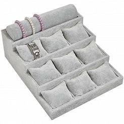 Ekspozytor schodkowy z 9 poduszkami i wałkiem szary