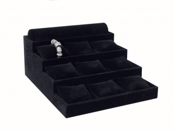 Ekspozytor schodkowy z poduszkami i wałkiem czarny